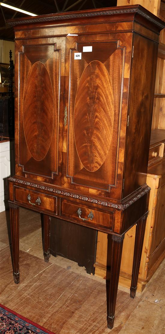 Inlaid mahogany cabinet with drawers below
